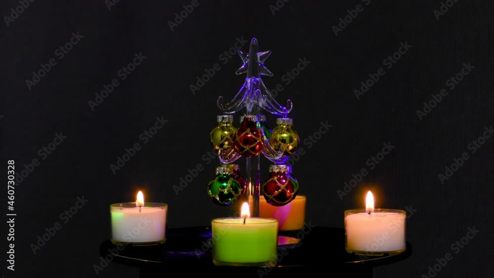 Christmas tree surrounded by Christmas candles