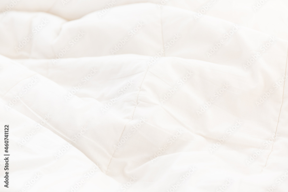 White crumpled blanket background texture, soft fabric texture background wallpaper.