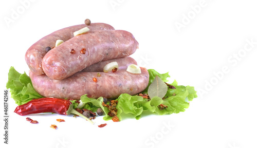 Raw pork sausages.Grilled sausages in close-up, isolated on a white background.Selective focus.