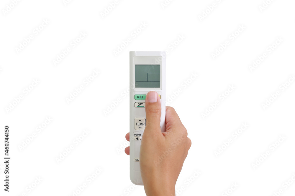 People hand push button of air conditioner remote control isolated on white background. Image with clipping path People hand push button of air conditioner remote control isolated on white background. Image with clipping path
