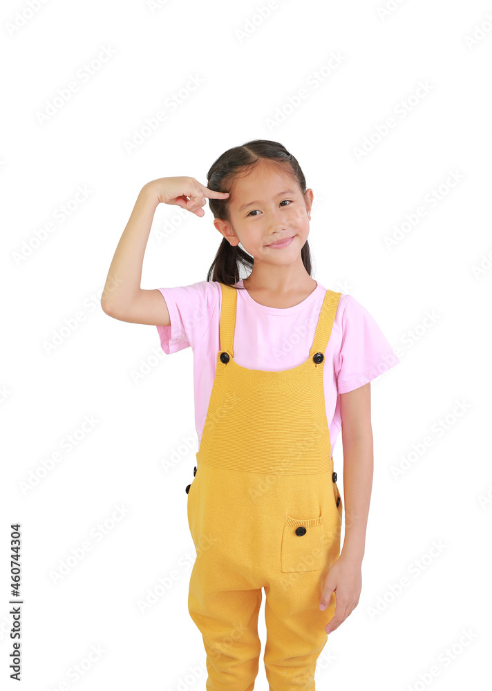 Portrait of Asian little girl child pointing forefinger to head and looking beside isolated over white background Portrait of Asian little girl child pointing forefinger to head and looking beside isolated over white background