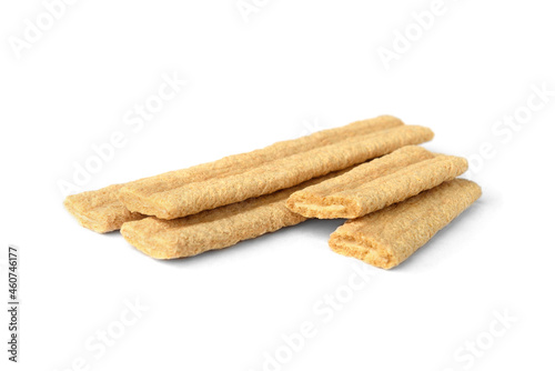 Organic cereal bar with boiled condensed milk filling isolated on white background.