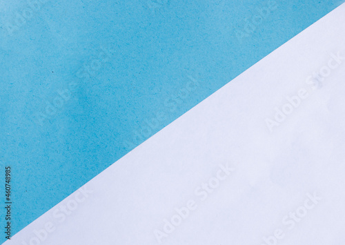 Two color paper with blue and white of the image. texture of colored paper. Trendy colors for design. Abstract geometric background.
