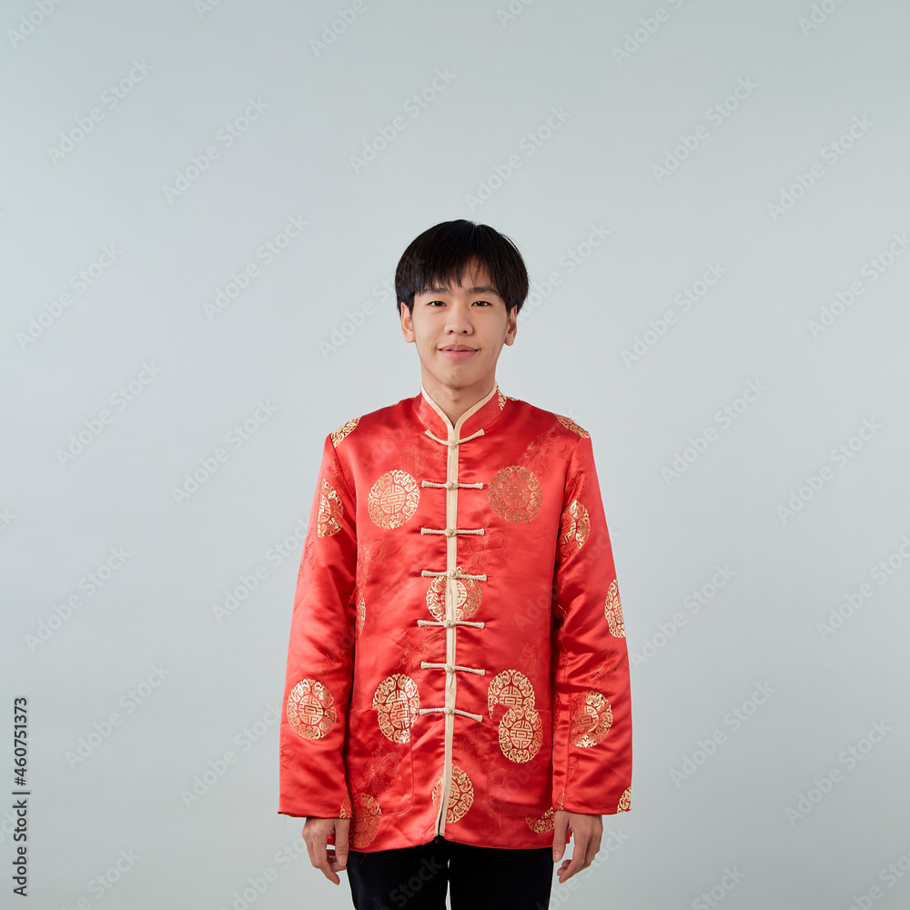 Asian man with Chinese traditional dress cheongsam Asian man with Chinese traditional dress cheongsam