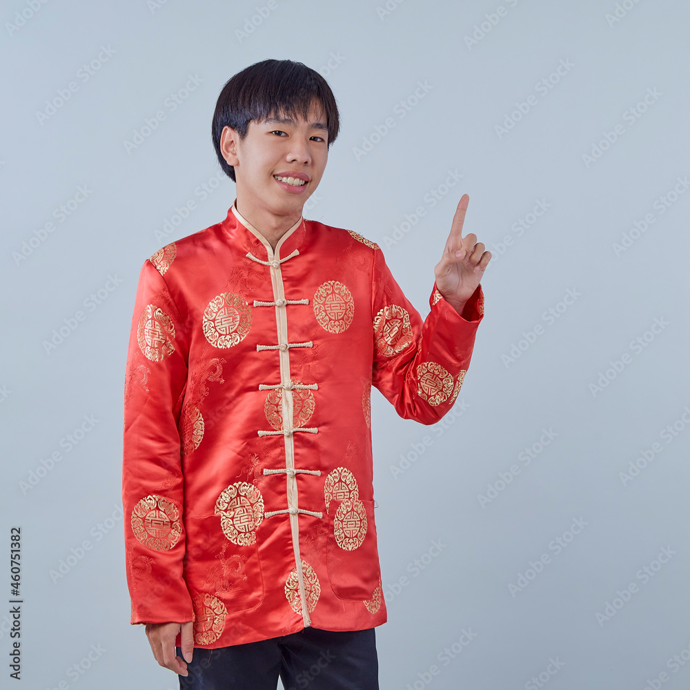 Asian man with Chinese traditional dress cheongsam Asian man with Chinese traditional dress cheongsam