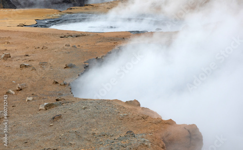 Steaming fumarole in geothermal area of Hverir, Iceland photo