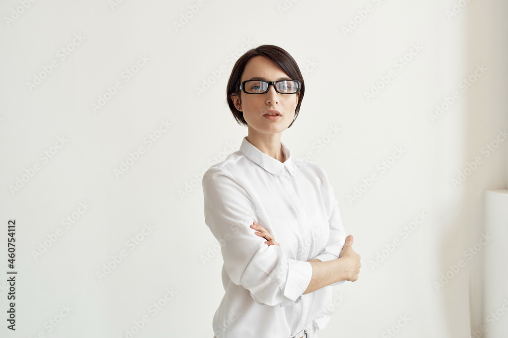 Businesswoman with glasses self-confidence light background Businesswoman with glasses self-confidence light background