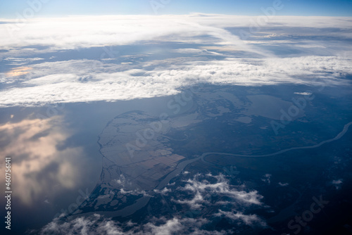 Aerial view of the mouth of the Rhone River in France from an airplane window 