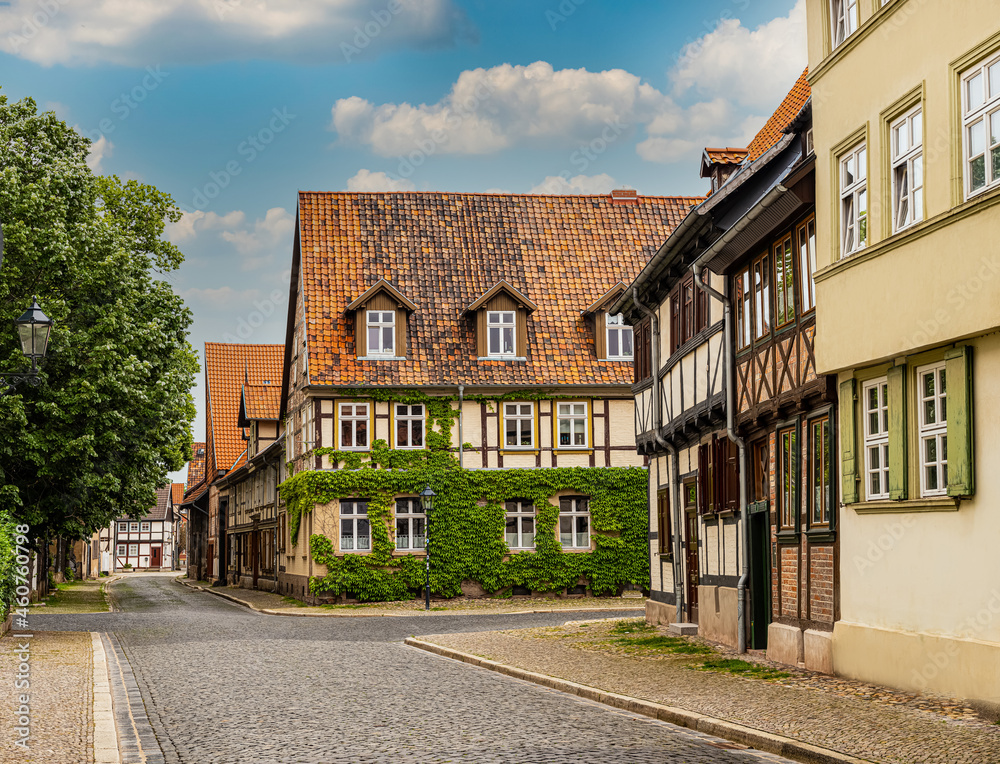 Quedlinburg,Saxony-Anhalt, Germany. 06 July 2021. small town with old vintage small colored houses and old cobblestone pavement. UNESCO World Heritage city