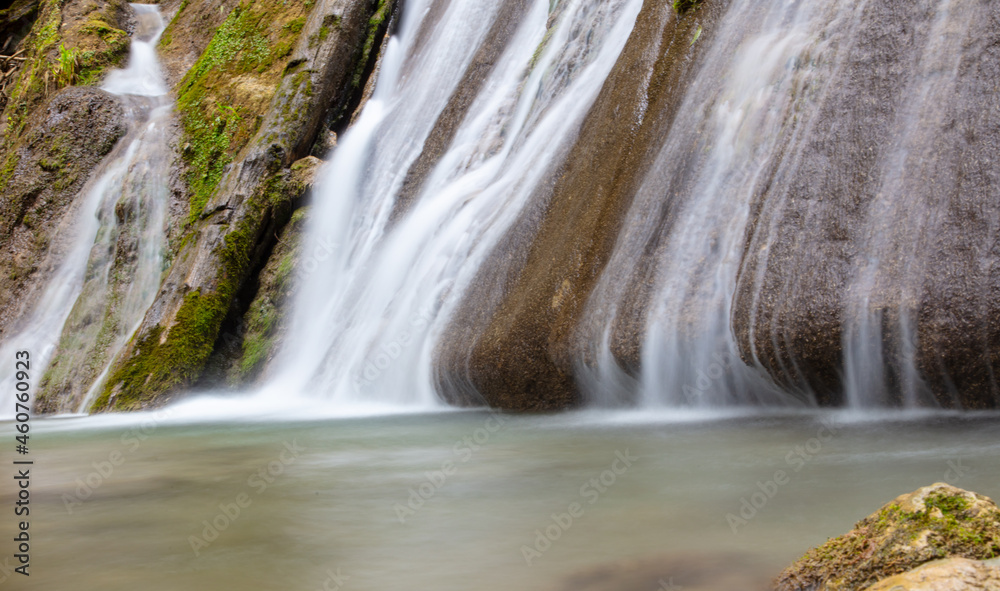 Fototapeta premium Waterfall on a mountain river.