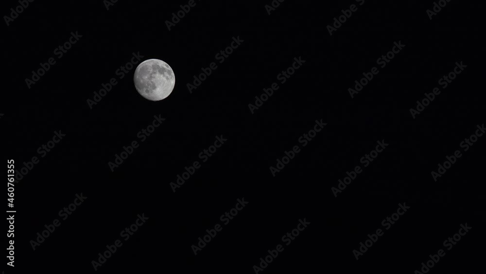 Full Moon Rises in Clouds on Sky in Night, View Moon Light, Evening Astrology Full Moon Rises in Clouds on Sky in Night, View Moon Light, Evening Astrology