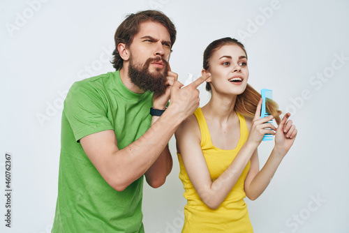 young couple in the bathroom morning facial hygiene