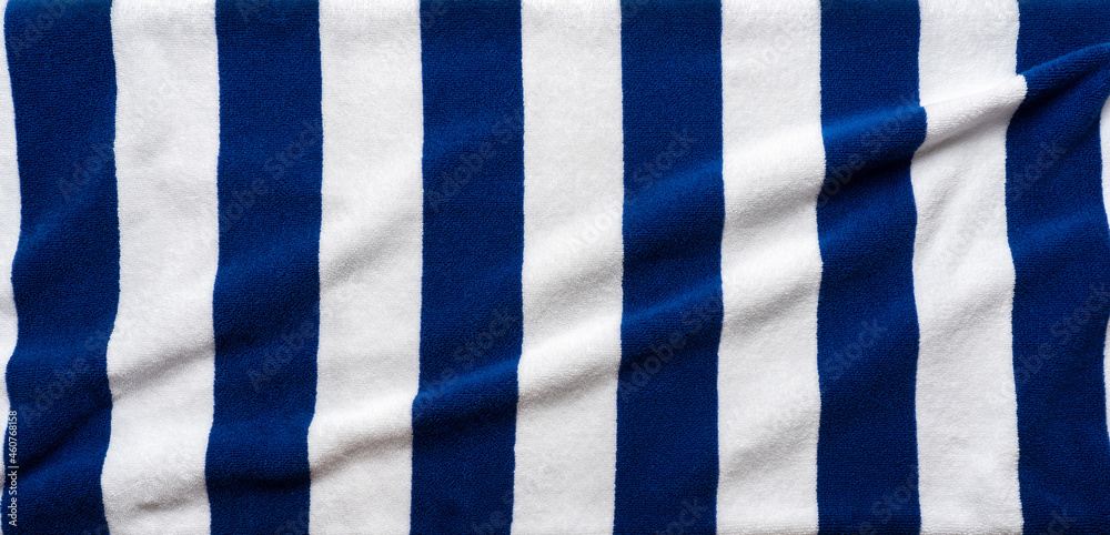 Blue stripes beach towel mock up isolated on white background, flat lay top view shot Blue stripes beach towel mock up isolated on white background, flat lay top view shot