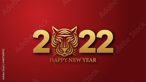 Happy new year 2022 vector. golden 2022 Text with a tiger head. Happy Chinese new year. Year of the tiger zodiac. 2022 design suitable for greetings, invitations, banners, or backgrounds.