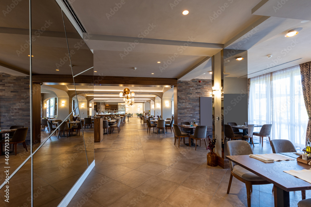 Interior of an empty modern hotel restaurant Interior of an empty modern hotel restaurant