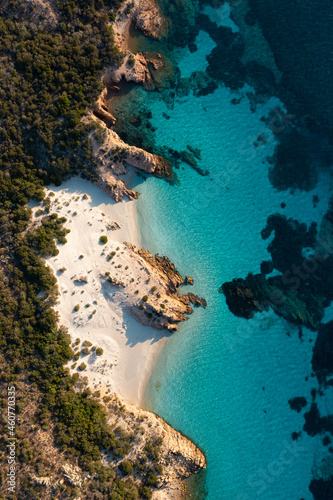 View from above  stunning aerial view of Spargi Island with Cala Soraya  a white sand beach bathed by a turquoise water. La Maddalena archipelago National Park  Sardinia  Italy.