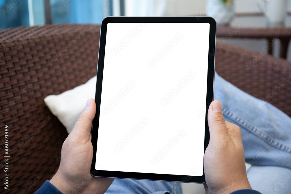 male hands holding computer tablet with isolated screen