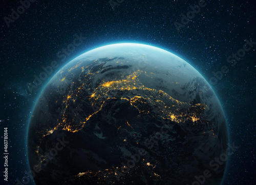Amazing blue planet Earth with night yellow lights of megacities in space with stars. Deep space with a planet. Civilization concept. Cities of Central Europe