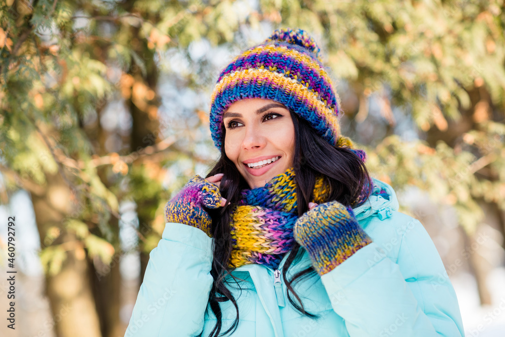 Photo of dreamy inspired lady beaming smile wear knitted mittens headwear scarf coat in park outside Photo of dreamy inspired lady beaming smile wear knitted mittens headwear scarf coat in park outside