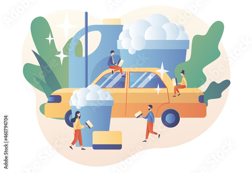 Tiny people washing automobile with water and foam. Car wash service. Transport is clean. Modern flat cartoon style. Vector illustration on white background