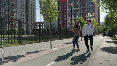 Wallpaper Mural Street dance. Young couple dancing in the street. The guy and the girl move rhythmically. They dance and smile. In a new area. Stylish guy and girl. Torontodigital.ca