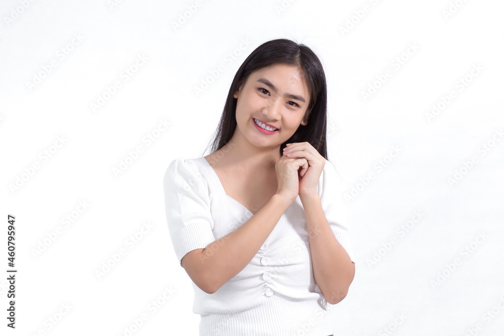 Asian beautiful lady who has long hair smiles and shows her hand near face on white background Asian beautiful lady who has long hair smiles and shows her hand near face on white background