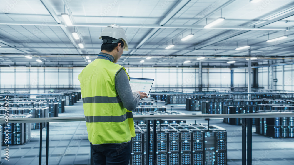 custom made wallpaper toronto digitalData Center Engineer in High Visibility Vest Using Laptop Computer. Server Farm Cloud Computing Facility with Asian Male System Administrator Working with Data Protection Network for Cyber Security.