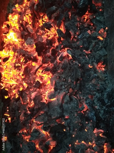 burning hot coals yellow red ornage red spectrum for cooking. Grill food on coals