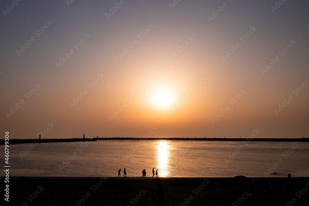 Sunset on the coast. Sunset at Barra beach in Portugal. Calm and relaxation at sunset