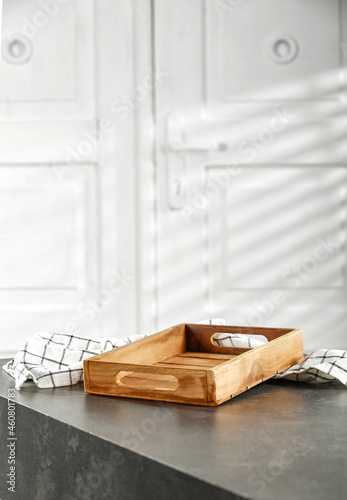 Desk of free space and white wall background with shadows. 