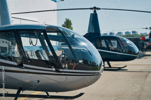 Choppers parked at vertiport on clear summer day