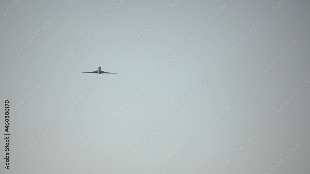 Large passenger plane ascending against blue sky. Aircraft takeoff. Plane taking off. Air travel concept. Real time, static shot Large passenger plane ascending against blue sky. Aircraft takeoff. Plane taking off. Air travel concept. Real time, static shot