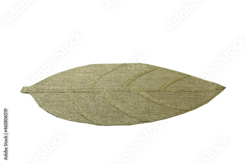 perspective view of isolated in the form of a leaf placemat for food. Close up of bamboo mat Empty space for your design © sosiukin