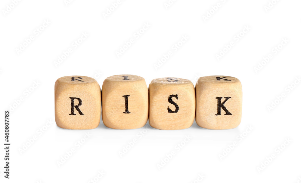 Wooden cubes with word Risk isolated on white Wooden cubes with word Risk isolated on white