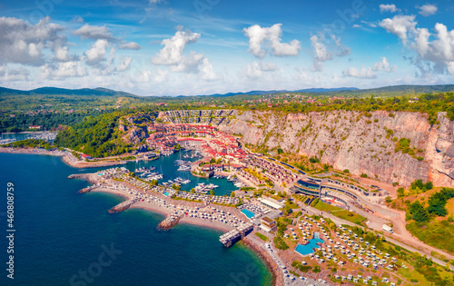 Fototapeta Naklejka Na Ścianę i Meble -  View from flying drone opf Marina di Portopiccolo, Golfo di, Trieste TS, Italy, Europe. Stunning summer scene of Portopiccolo Sistiana Beach. Aerial landscape photography.