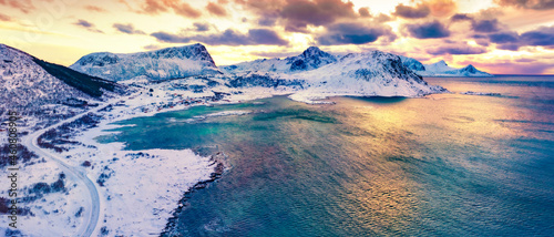 Incredible winter view from flying drone of Vik Beach. Colorful morning scene of Lofoten Islands. Spectacular sunrise on Norway, Europe. Norwegian seascape. Beautiful winter scenery..