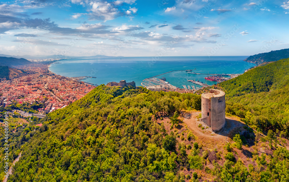 View from flying drone of Bastiglia tower and Arechi Castle. Aerial summer cityscape of Salerno town, Italy, europe. Traveling concept background.