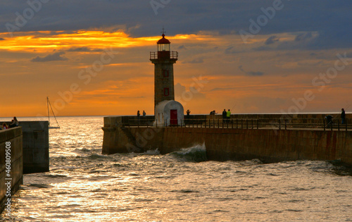 Felgueiras lighthouse at the mouth of the river Douro, in Porto, Portugal photo