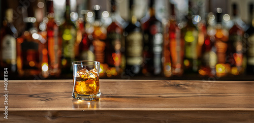 Slika na platnu Glass of whiskey on the bar counter