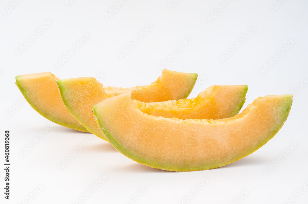 melons ripe on a white background and in the beds melons ripe on a white background and in the beds