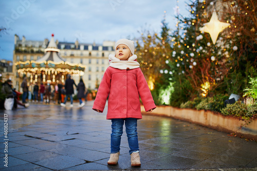 Adorable preschooler girl on Christmas market in Paris, France © Ekaterina Pokrovsky