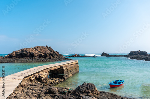 El Puertito wooden footbridge on the Isla de Lobos, next to the north coast of the island of Fuerteventura, Canary Islands. Spain photo