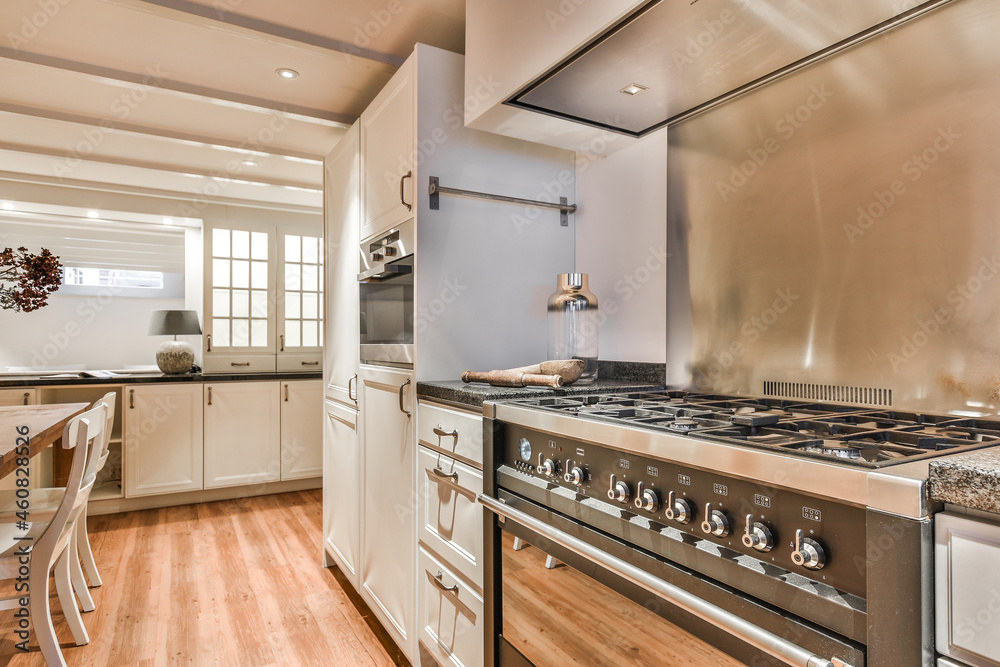 Interior of modern kitchen with dining table Stock Photo | Adobe Stock