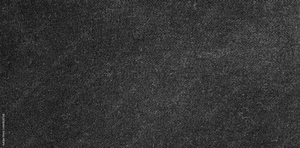 Black denim background. Denim fabric. Top view photo for background. Copy area and text area Black denim background. Denim fabric. Top view photo for background. Copy area and text area
