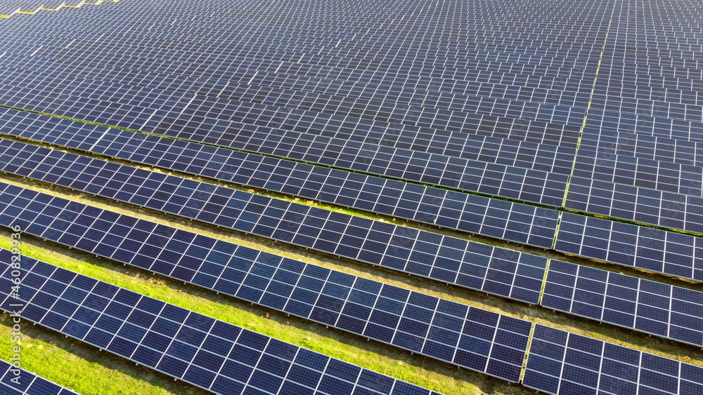 Aerial drone view flight over solar power station panels. Aerial drone view flight over solar power station panels.
