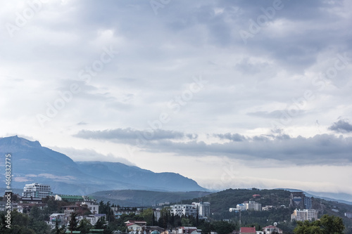 View of city by mountains © dashabelozerova