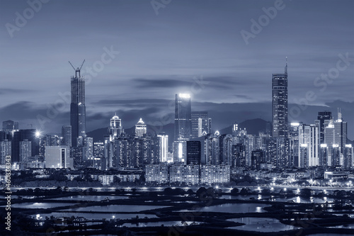 Night scenery of panorama of skyline of Shenzhen city, China. Viewed from Hong Kong border