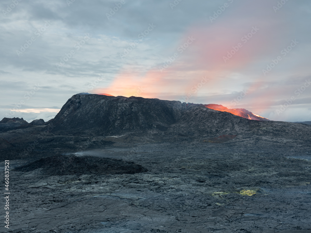 Volcano crater and hot lava fields.