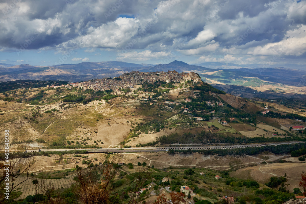 the town of Calascibetta seen from Enna in Sicily on a cloudy day at the end of summer