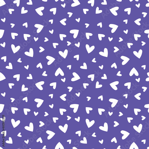 Purple seamless pattern with white hearts.